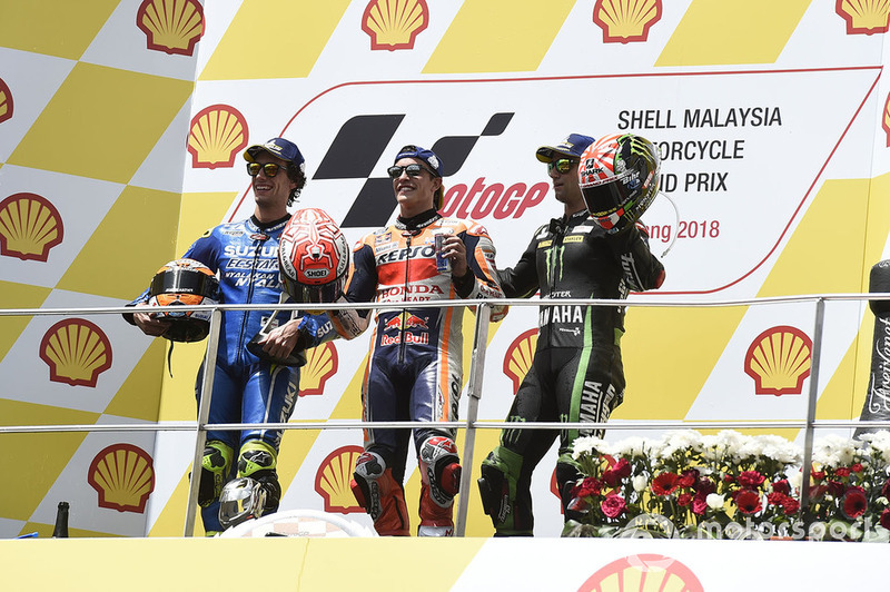 Подіум: друге місце Алекс Рінс, Team Suzuki MotoGP, переможець гонки Марк Маркес, Repsol Honda Team, третє місце Жоанн Зарко, Monster Yamaha Tech 3