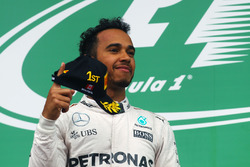 Race winner Lewis Hamilton, Mercedes AMG F1 celebrates on the podium