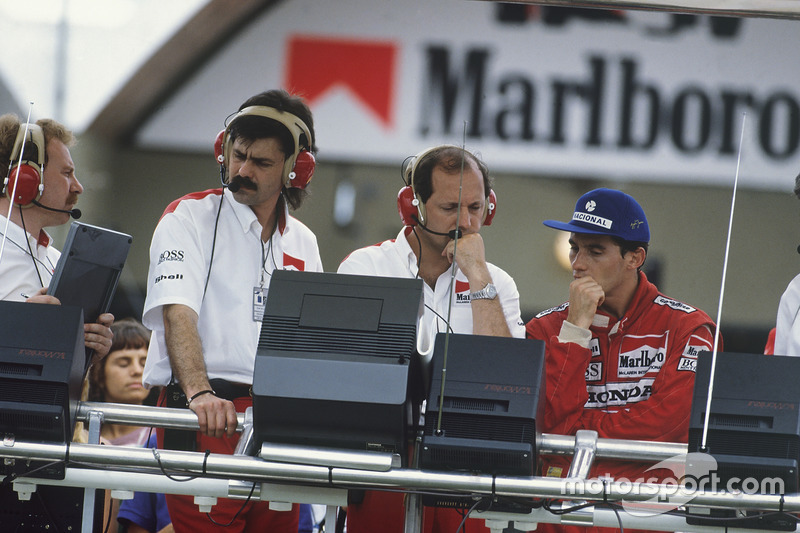 Ayrton Senna, McLaren MP4/4 Honda, DQ, on the pit gantry with Ronnie Peterson Dennis and Gordon Murray