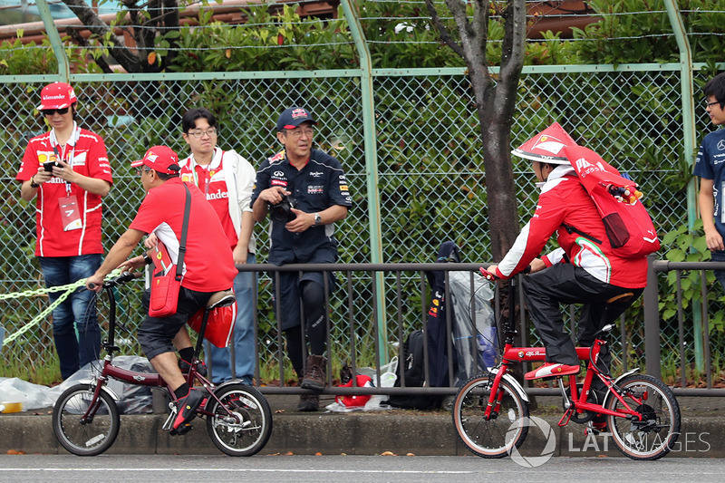 Ferrari fans on bikes