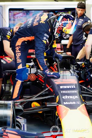  Daniel Ricciardo, Red Bull Racing, climbs in to his cockpit which is fitted, the Halo cockpit protection system