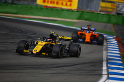 Carlos Sainz Jr., Renault Sport F1 Team R.S. 18, leads Fernando Alonso, McLaren MCL33