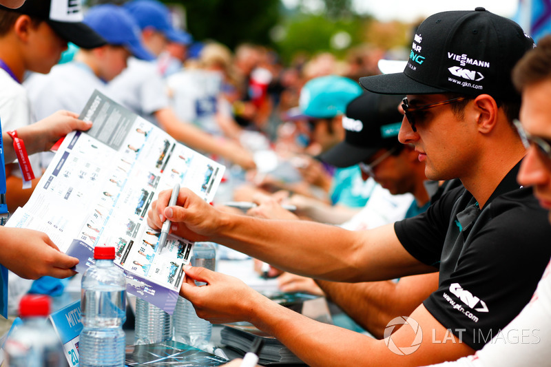 Mitch Evans, Jaguar Racing, signs autographs for fans
