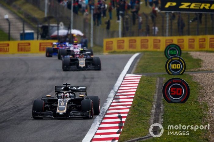 Romain Grosjean, Haas F1 Team VF-19, leads Kevin Magnussen, Haas F1 Team VF-19