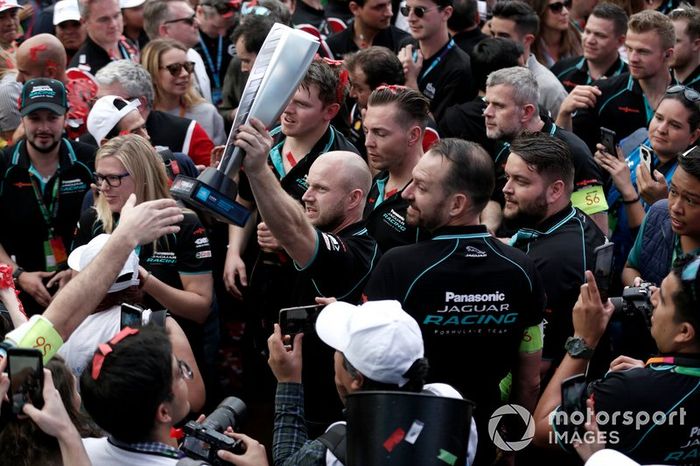 The Jaguar team celebrate at the podium