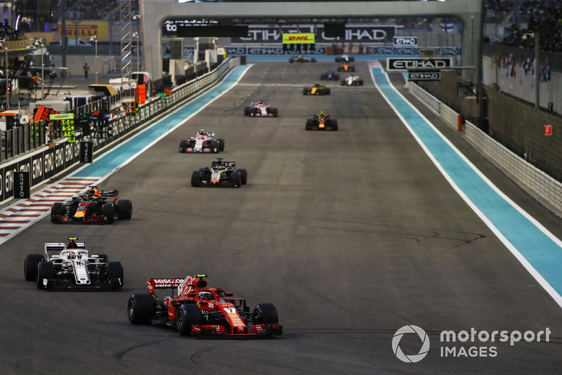 Kimi Raikkonen, Ferrari SF71H, leads Charles Leclerc, Sauber C37, Daniel Ricciardo, Red Bull Racing RB14, Romain Grosjean, Haas F1 Team VF-18, Esteban Ocon, Racing Point Force India VJM11, and the remainder of the field