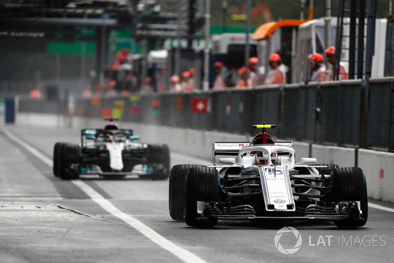 Charles Leclerc, Sauber C37, leads Lewis Hamilton, Mercedes AMG F1 W09