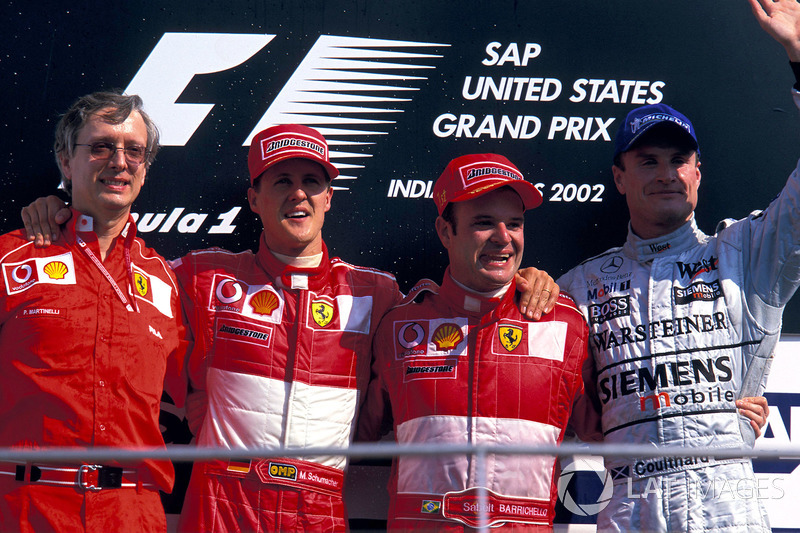 Podium : Paolo Martinelli, directeur moteur Ferrari, le second Michael Schumacher, Ferrari, le vainqueur Rubens Barrichello, Ferrari, le troisième David Coulthard, McLaren