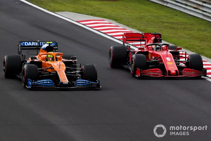 Lando Norris, McLaren MCL35, Sebastian Vettel, Ferrari SF1000