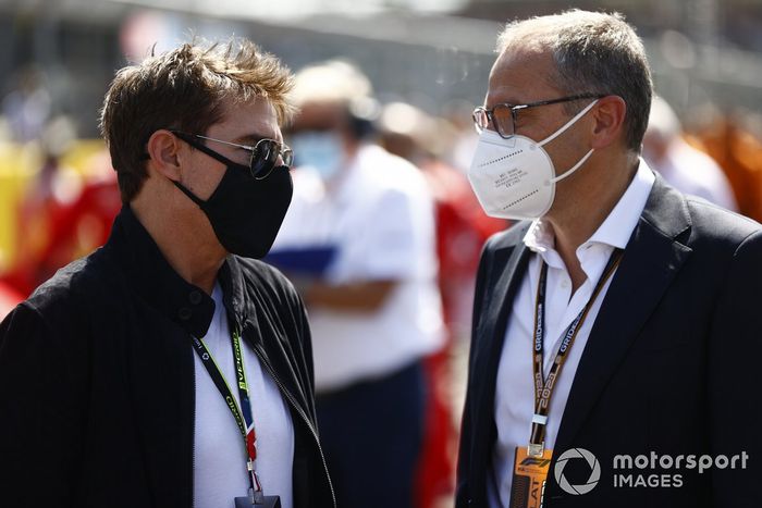 Tom Cruise con Stefano Domenicali, director general de la Fórmula 1