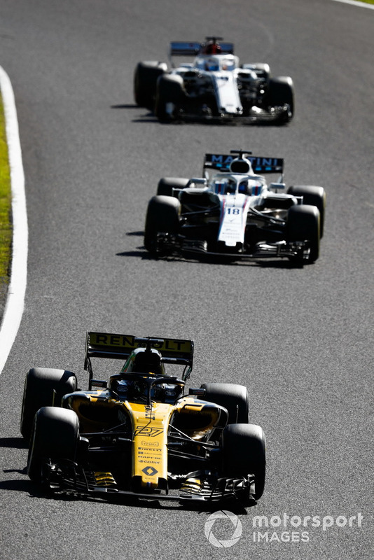 Nico Hulkenberg, Renault Sport F1 Team R.S. 18, leads Lance Stroll, Williams FW41, and Marcus Ericsson, Sauber C37