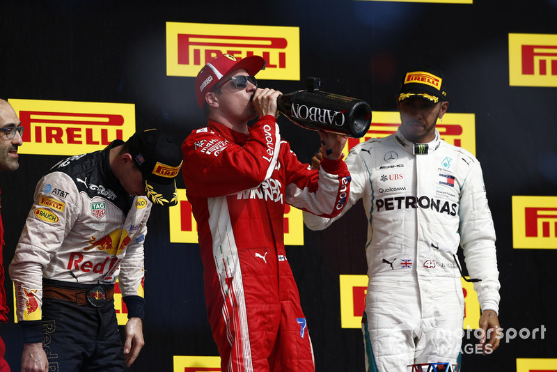 Podio: ganador de la carrera Kimi Raikkonen, Ferrari
