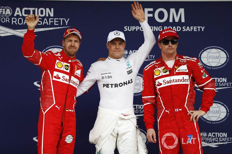Ganador de la pole Valtteri Bottas, Mercedes AMG F1, segundo Sebastian Vettel, Ferrari, tercero Kimi Raikkonen, Ferrari