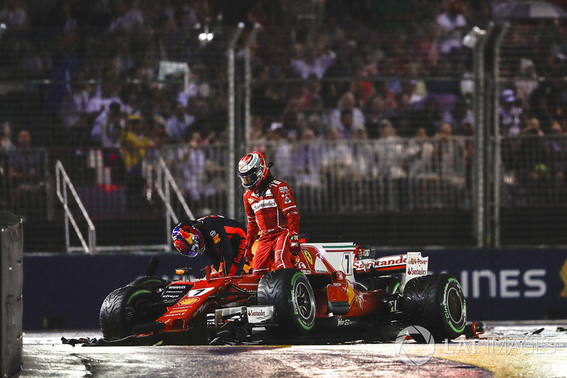 Kimi Raikkonen, Ferrari SF70H, Max Verstappen, Red Bull Racing RB13, climb out of their damaged cars