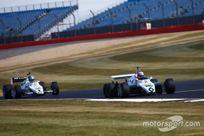 Jenson Button drives a 1982 Williams FW08B, ahead of Guy Martin in a 1983 Williams FW08C