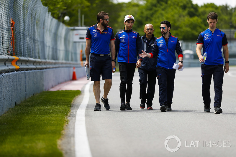 Pierre Gasly, Toro Rosso, walks the circuit with colleagues