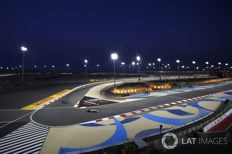 Lewis Hamilton, Mercedes W05, leads Nico Rosberg, Mercedes W05, and Felipe Massa, Williams FW36