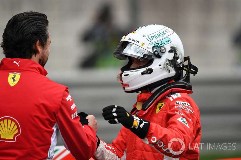 Pole sitter Sebastian Vettel, Ferrari celebrates in parc ferme