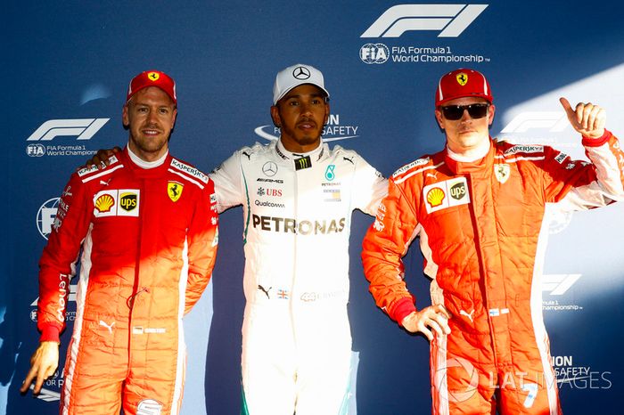 Lewis Hamilton, Mercedes AMG F1, celebra su primera pole position entre Kimi Raikkonen, Ferrari y Sebastian Vettel, Ferrari