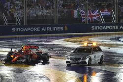 The crashed cars of Max Verstappen, Red Bull Racing RB13 and Kimi Raikkonen, Ferrari SF70H and Medical car