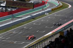 Sebastian Vettel, Ferrari SF70H and Lewis Hamilton, Mercedes-Benz F1 W08 battle for position
