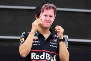 Yuki Tsunoda, Red Bull Racing Team wears a Sebastian Vettel face mask
