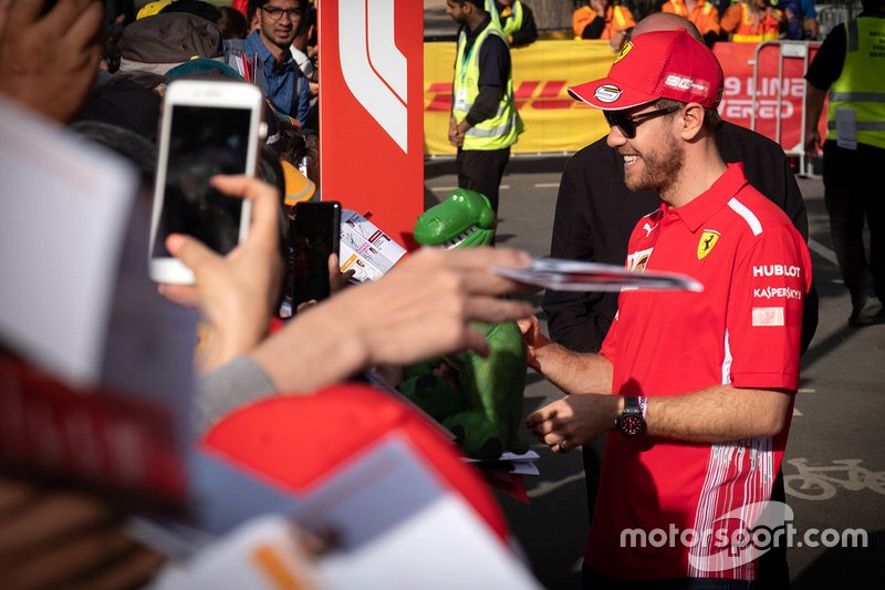 Sebastian Vettel, Ferrari signs autographs for the fans