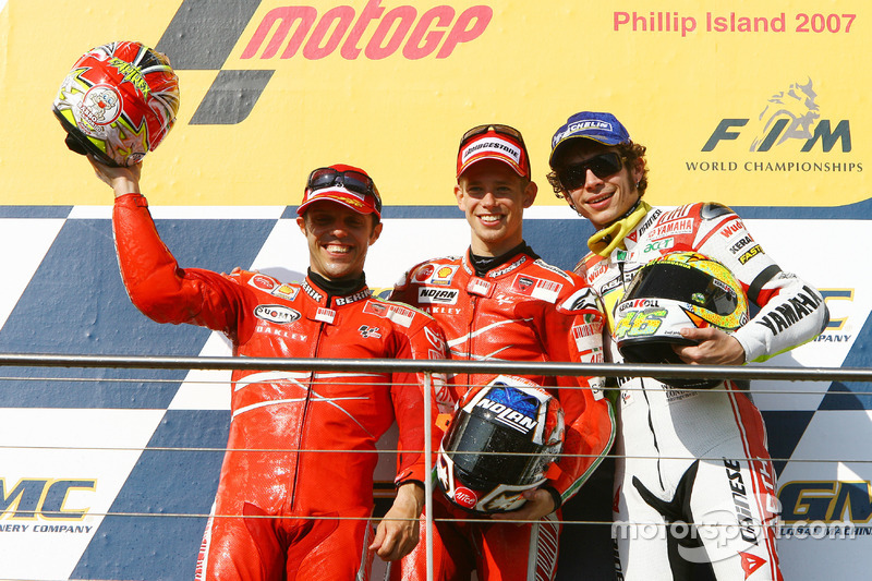 Podium: second place Loris Capirossi, Ducati; Race winner Casey Stoner; third place  Valentino Rossi, Yahmaha