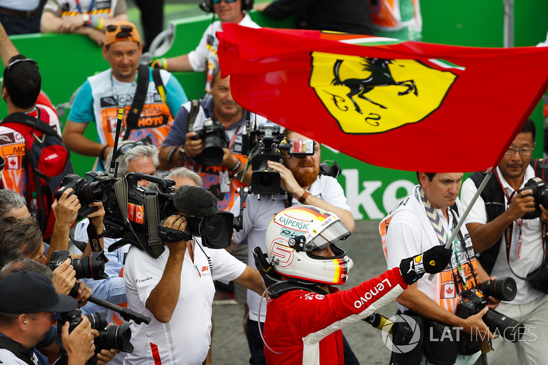 Sebastian Vettel, Ferrari, merayakan kemenangan