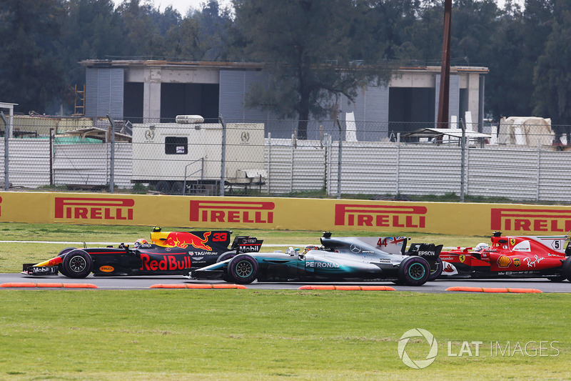 Max Verstappen, Red Bull Racing RB13, leads, Lewis Hamilton, Mercedes AMG F1 W08 and Sebastian Vette