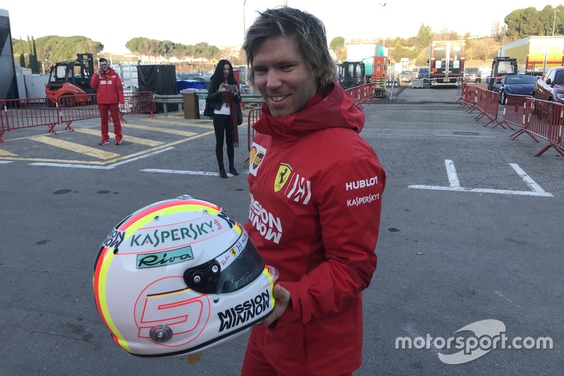 Antti Kontsas with Sebastian Vettel's helmet