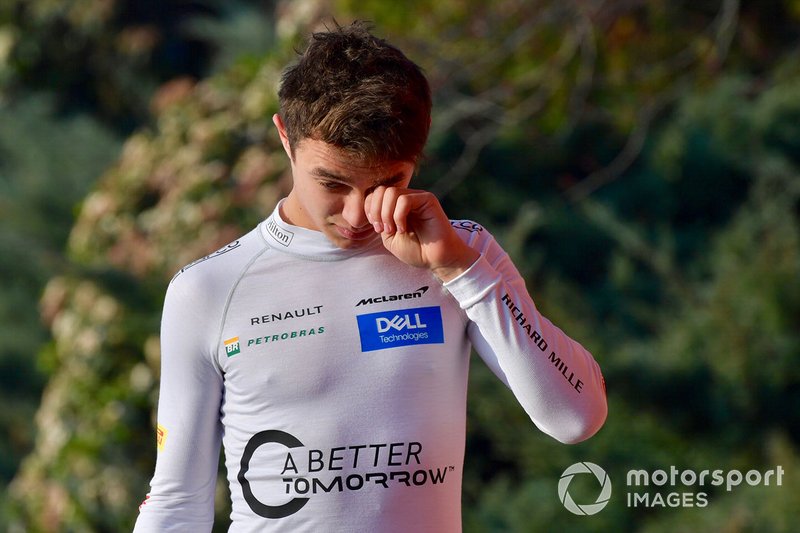 Lando Norris, McLaren walks in after a trip into the gravel