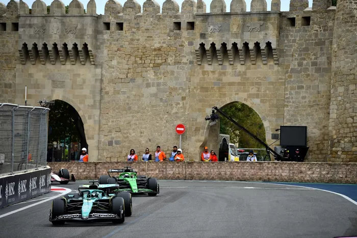 Nico Hulkenberg, Sauber, Lance Stroll, Aston Martin Racing