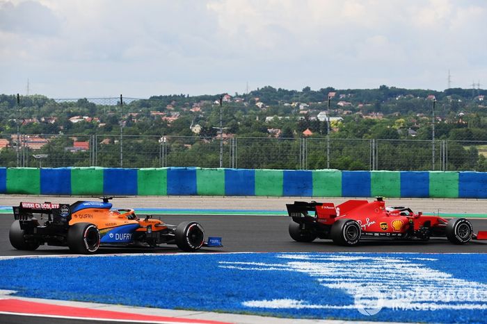 Charles Leclerc, Ferrari SF1000, leads Carlos Sainz Jr., McLaren MCL35