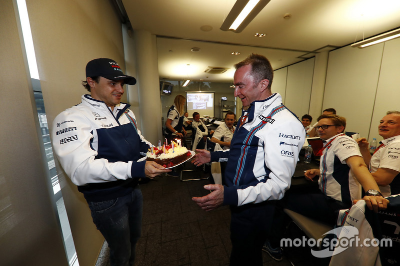 Felipe Massa, Williams, presents a birthday cake to Paddy Lowe, Williams Formula 1