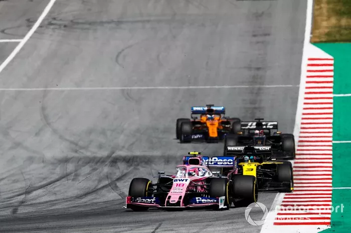 Lance Stroll, Racing Point RP19, leads Daniel Ricciardo, Renault F1 Team R.S.19, Romain Grosjean, Haas F1 Team VF-19, and Carlos Sainz Jr., McLaren MCL34