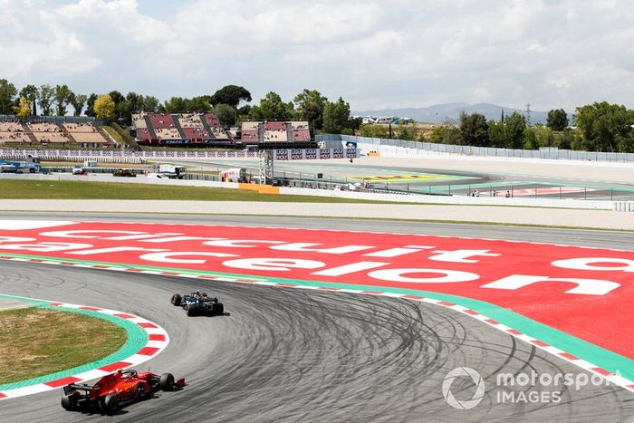 Kevin Magnussen, Haas F1 Team VF-19, Sebastian Vettel, Ferrari SF90