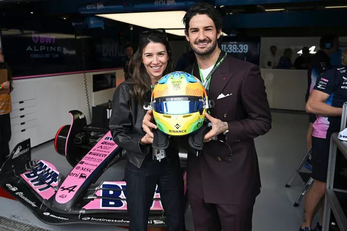 Alexandre Pato and Rebeca Abravanel in the Alpine F1 garage