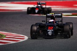 Jenson Button, McLaren MP4-31 on track ahead of Fernando Alonso, McLaren MP4-31