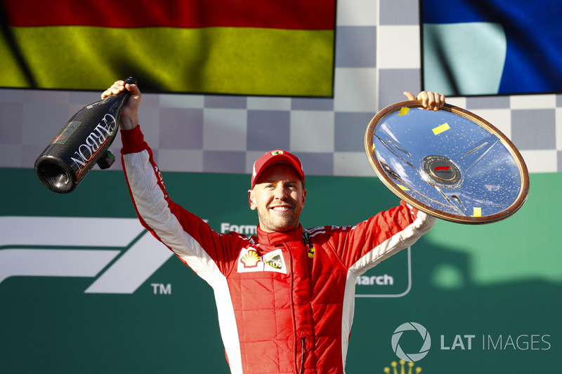 Sebastian Vettel, Ferrari, celebrates victory on the podium