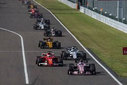 Sergio Perez, Sahara Force India VJM10 and Sebastian Vettel, Ferrari SF70H battle for position