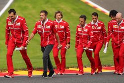 Sebastian Vettel, Riccardo Ferrari walks the track, Adami, Ferrari Race Engineer, Jock Clear, Ferrari Chief Engineer, trainer Antti Kontsas, the team