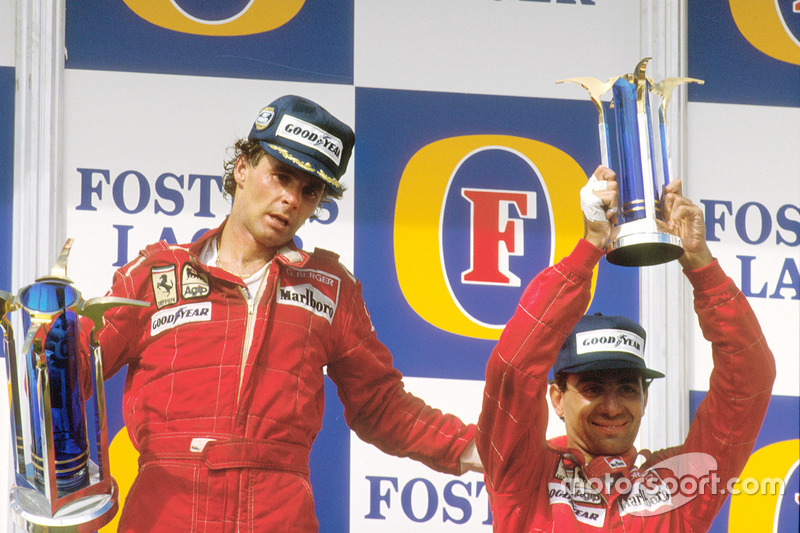 Podio: ganador de la carrera Gerhard Berger, Ferrari, tercer lugar Michele Alboreto, Ferrari