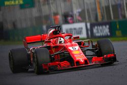 Sebastian Vettel, Ferrari SF71H, celebrates in his cockpit after winning the race