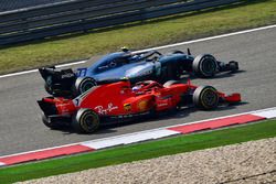 Kimi Raikkonen, Ferrari SF71H and Valtteri Bottas, Mercedes-AMG F1 W09 EQ Power+ battle