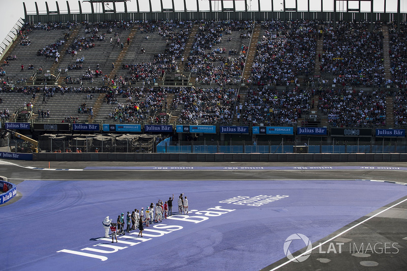 Drivers wave to the fans
