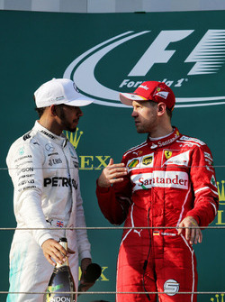 Sebastian Vettel, Ferrari; Lewis Hamilton, Mercedes AMG F1