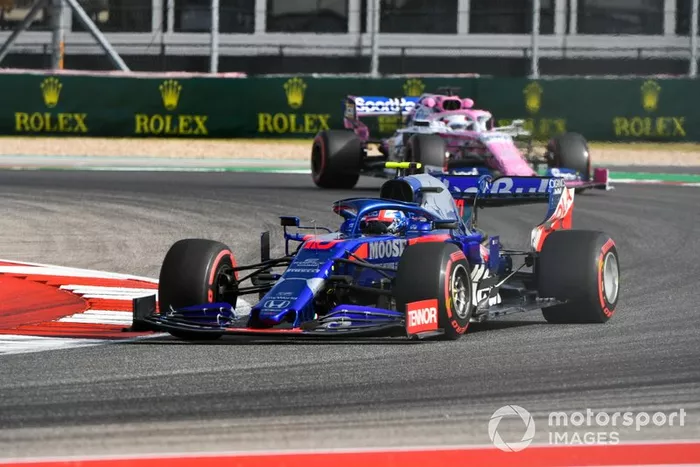 Pierre Gasly, Toro Rosso STR14, leads Sergio Perez, Racing Point RP19