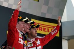 The podium, Ferrari, second; Max Verstappen, Red Bull Racing, race winner; Sebastian Vettel, Ferrari, third