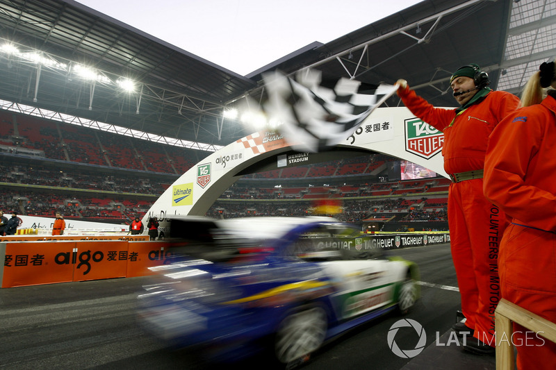 Sebastian Vettel crosses the line to win the Nations Cup